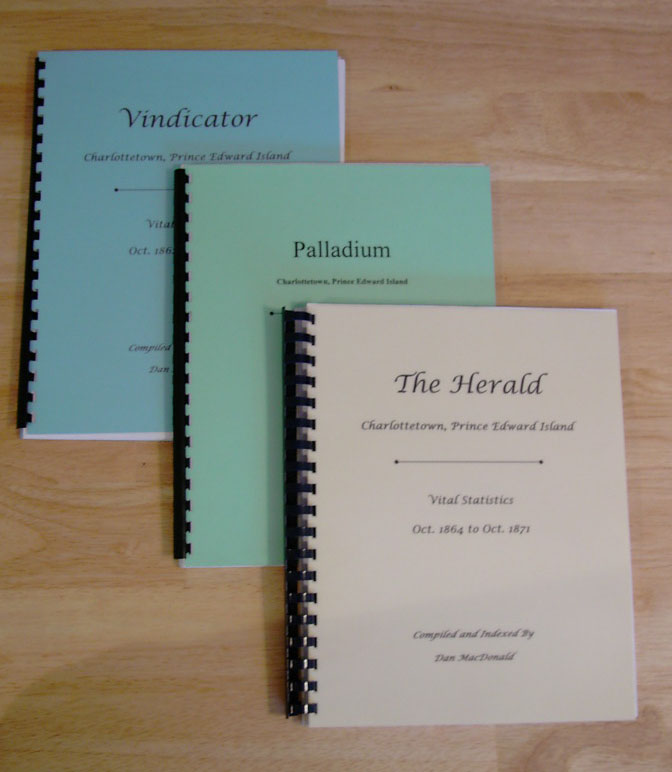 A photograph showing the covers of the vitals statistics compilations for the Herald, Palladium, and Vindicator newpapers